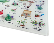 Load image into Gallery viewer, The Gardener&#39;s Alphabet Glass Cutting Board
