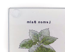 Load image into Gallery viewer, Witches' Herbs Glass Cutting Board