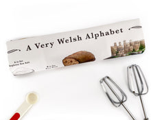 Load image into Gallery viewer, A Very Welsh Alphabet Tea Towel