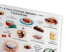 Load image into Gallery viewer, A Very Scottish Alphabet &#39;Food &amp; Drink&#39; Glass Cutting Board
