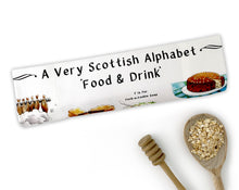 Load image into Gallery viewer, A Very Scottish Alphabet &#39;Food &amp; Drink&#39; Tea Towel
