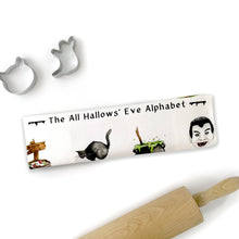 Load image into Gallery viewer, The All Hallows’ Eve Alphabet Tea Towel
